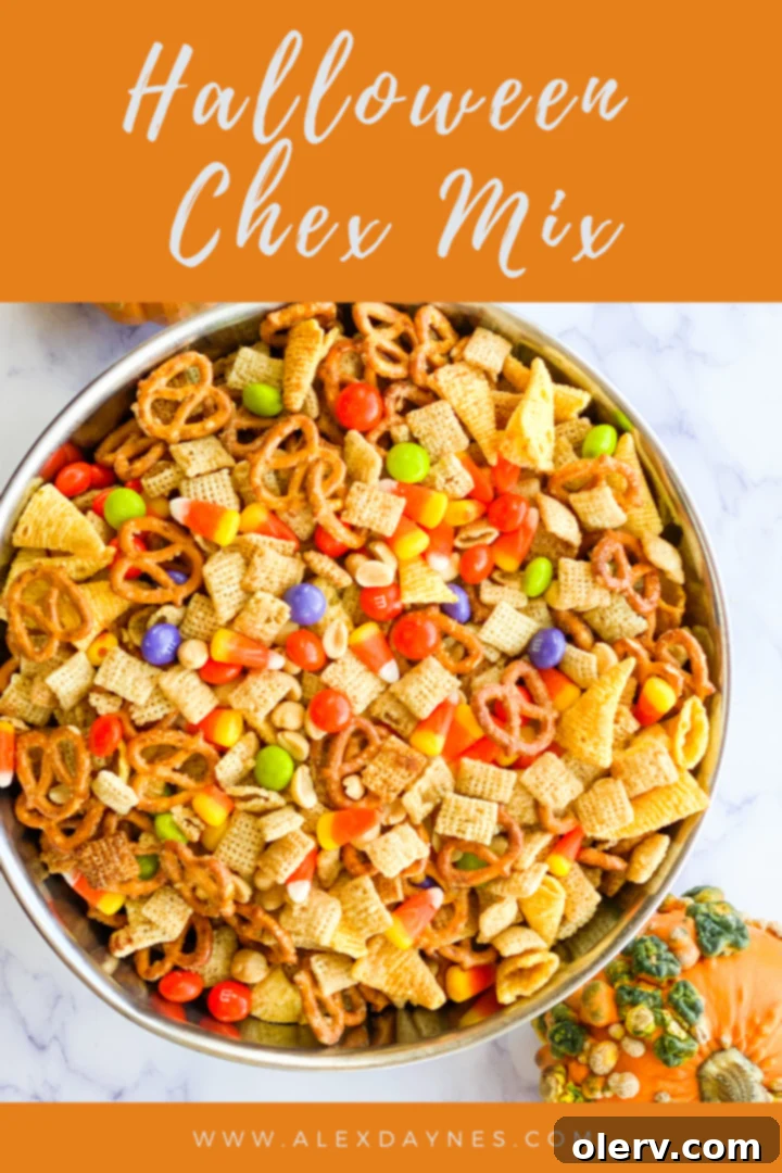Pinterest Pin for Halloween Chex Mix recipe