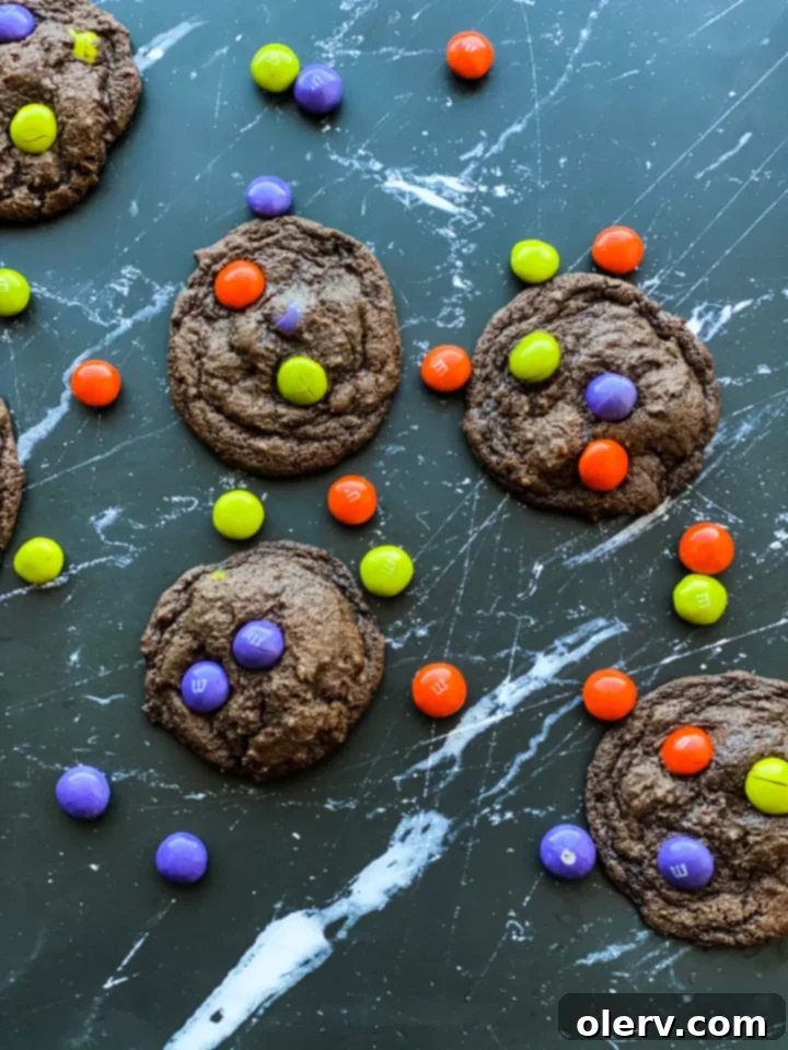 Spooktacular M&M Chocolate Cookies 7 A plate of Halloween M&M chocolate cookies, ready to be enjoyed