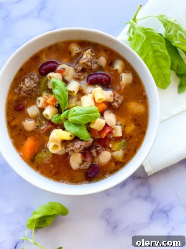 Effortless Comfort Pasta Fagioli 3 Close-up of a rustic bowl of Slow Cooker Pasta E Fagioli soup