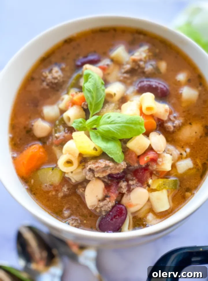 Effortless Comfort Pasta Fagioli 6 Ingredients for Slow Cooker Pasta E Fagioli laid out on a cutting board