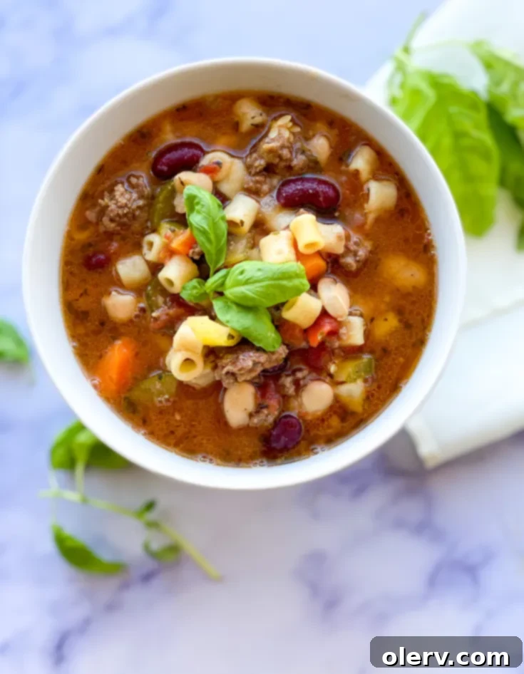 Effortless Comfort Pasta Fagioli 8 Delicious Slow Cooker Pasta E Fagioli soup with a spoon