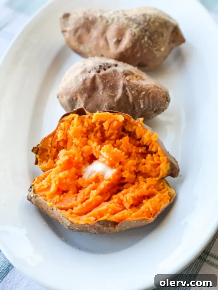 Shredded BBQ chicken in an Instant Pot, mixed with sauce and ready to be used as a delicious filling.