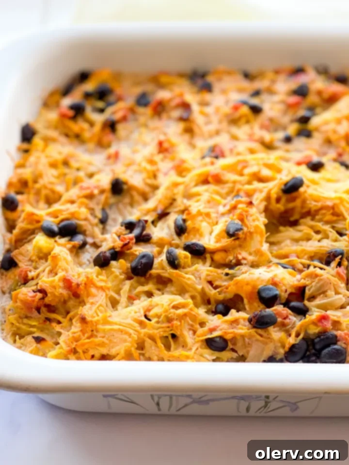 Spaghetti Squash Enchilada Bake 5 Spaghetti squash halved and cooked, ready to be shredded