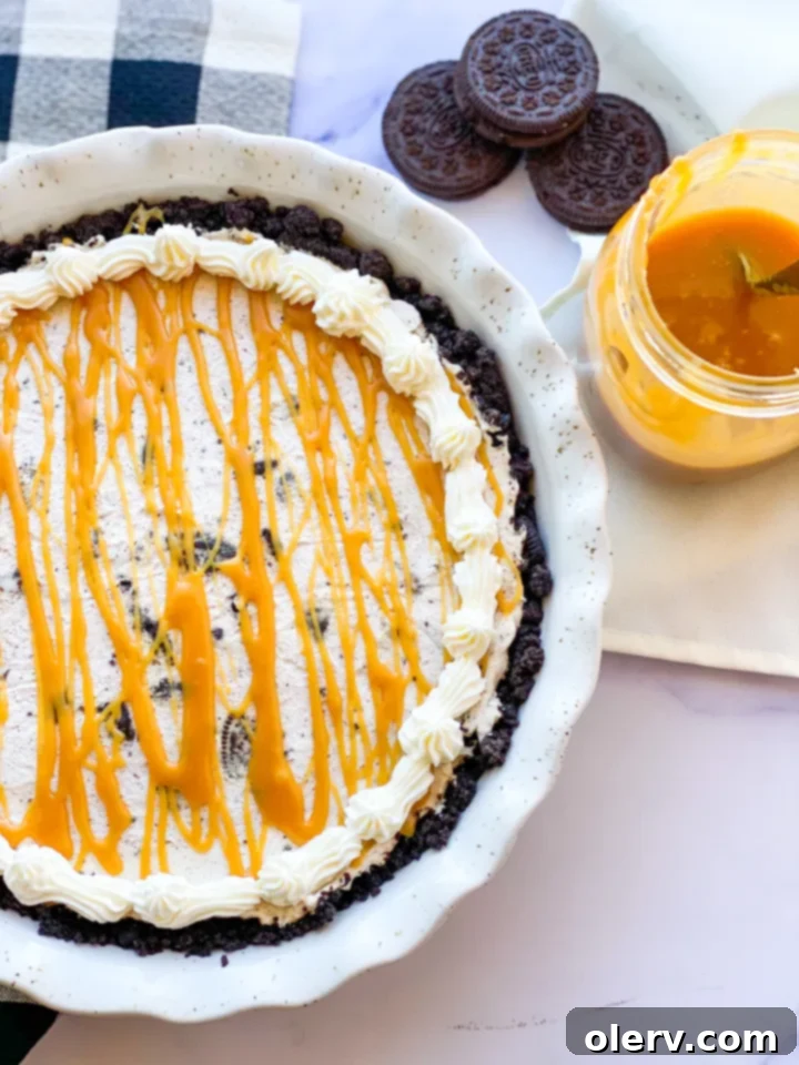 Decadent Salted Caramel Oreo Pie 3 A whole Salted Caramel Oreo Pie, freshly prepared and ready for chilling.
