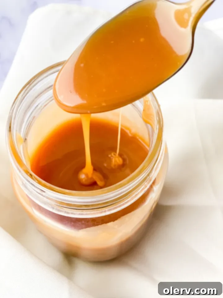Irresistible Homemade Salted Caramel 5 A bowl of granulated sugar, a stick of butter, and a container of heavy cream for caramel.