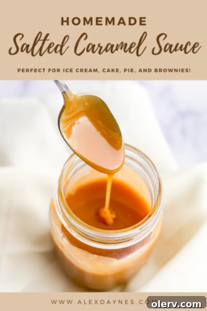 Homemade Salted Caramel Sauce in a jar, ready for pinning.