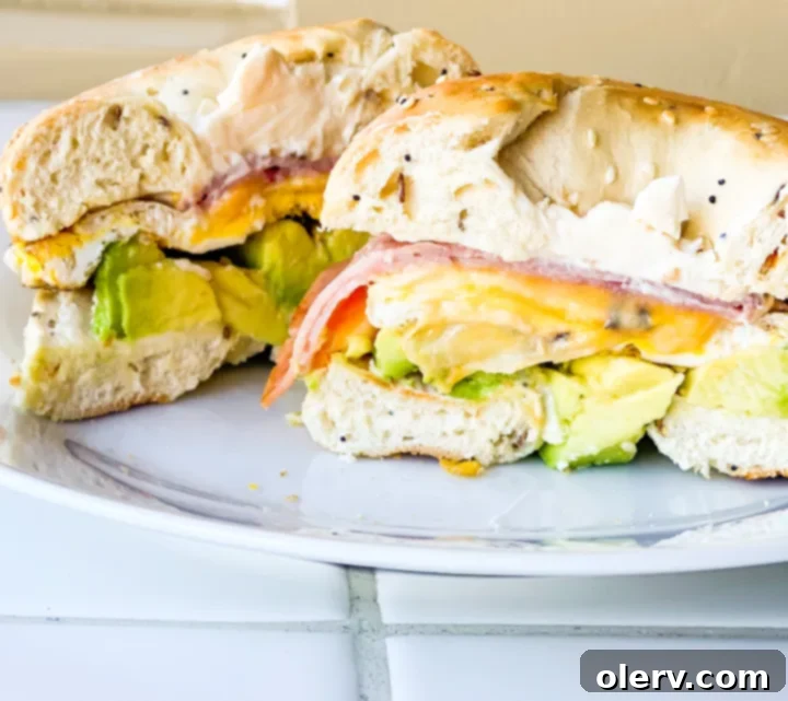 Ham, Egg, and Cheese Bagel Sandwich 3 Close-up of a freshly assembled ham, egg, and cheese bagel sandwich.