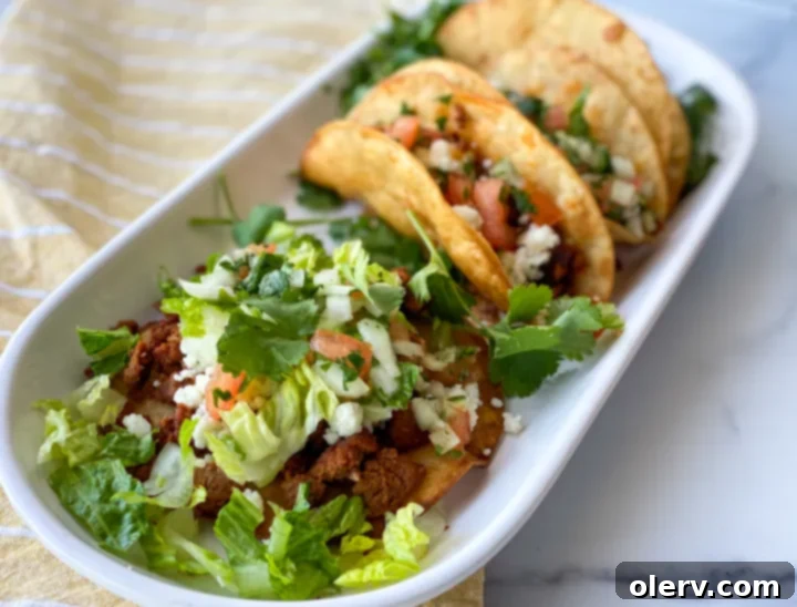 A selection of crispy taco shells ready to be filled with delicious toppings.
