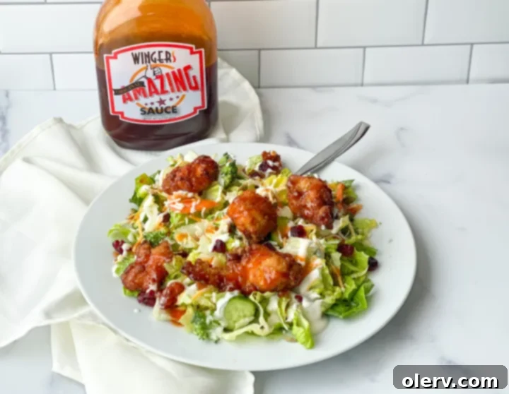 Golden Glaze Chicken Salad 3 A bowl of Winger's Copycat Sticky Chicken Salad, showing the mix of ingredients