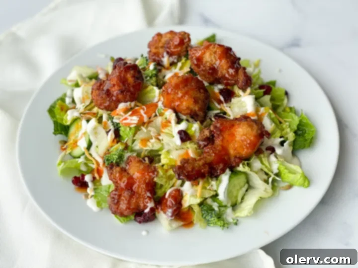 Golden Glaze Chicken Salad 4 Winger's Amazing Sauce bottle with chicken nuggets
