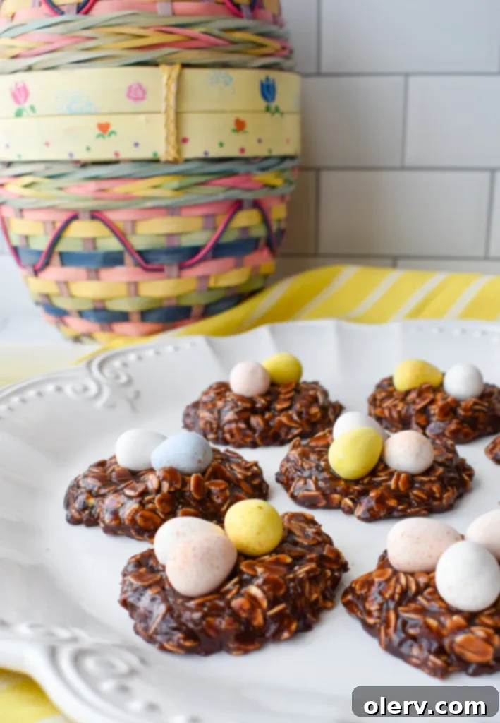 Easy No-Bake Easter Nests 7 A single No-Bake Easter Nest Cookie with three mini Cadbury eggs, ready to be enjoyed.