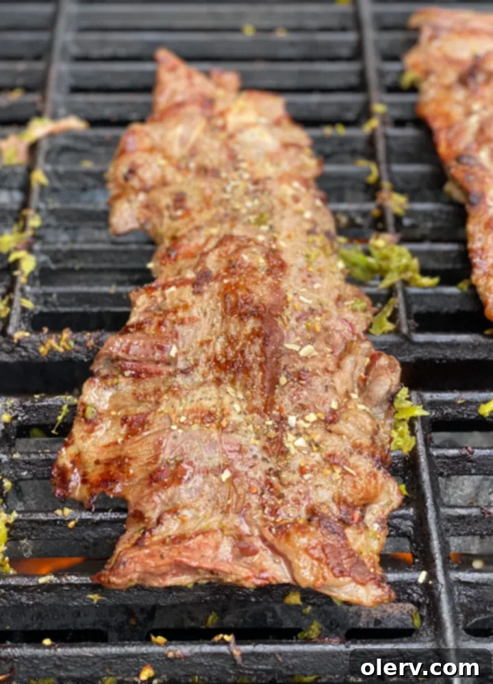 Zesty Cilantro Lime Flank Steak 12 Grilled flank steak with grill marks