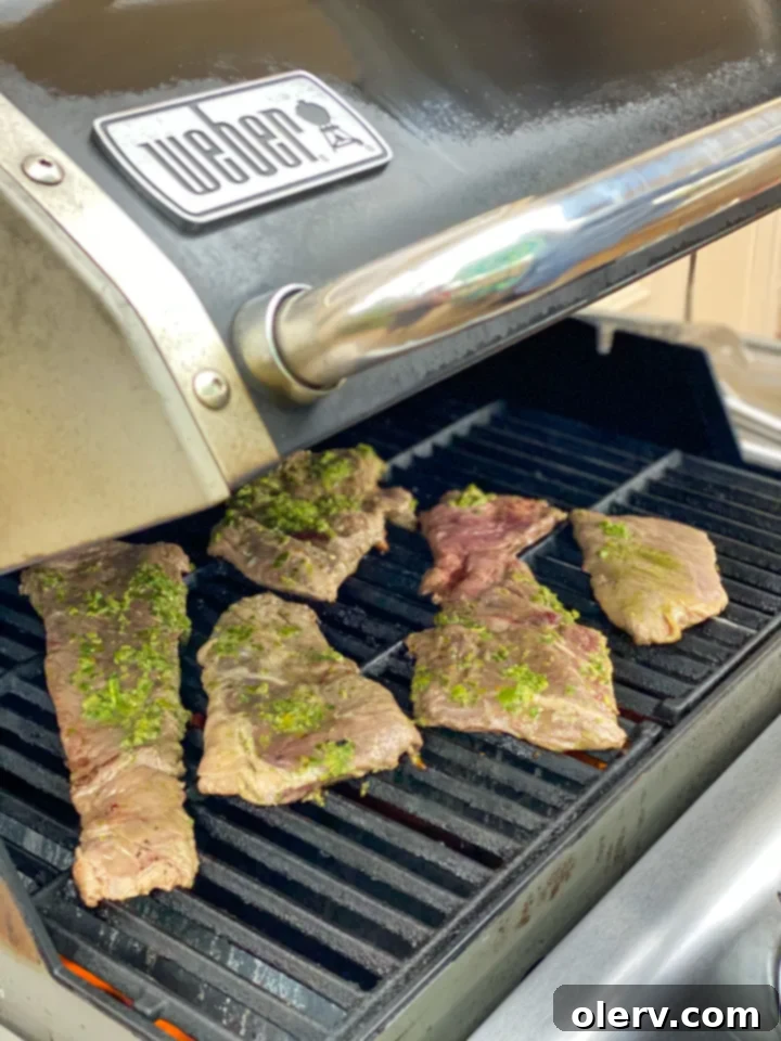 Zesty Cilantro Lime Flank Steak 4 Grilled flank steak ready to be sliced, on a cutting board