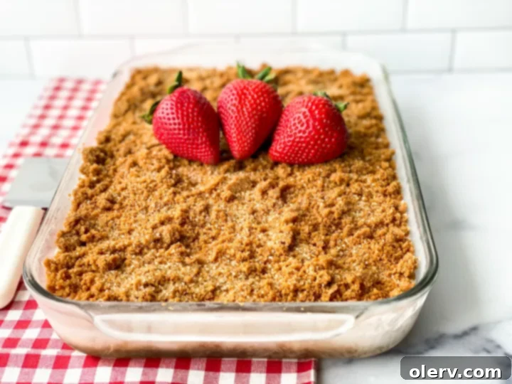 Chilled Strawberry Bliss 5 A square pan filled with the layered frozen strawberry dessert