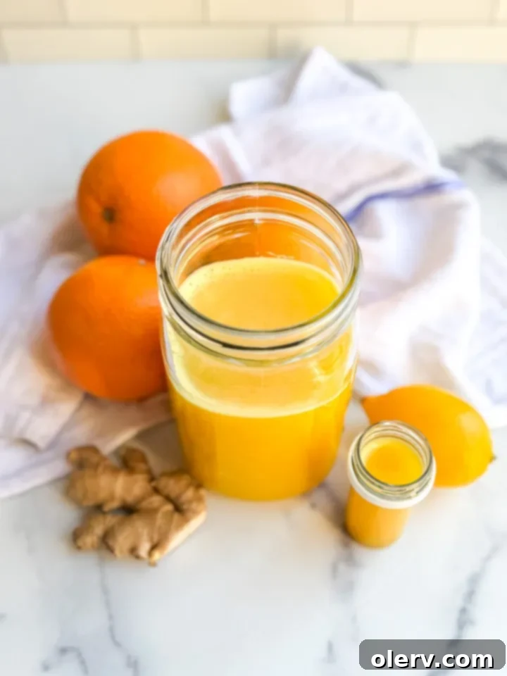 Homemade Ginger Immunity Boosters 6 Enjoying a homemade ginger immunity shot